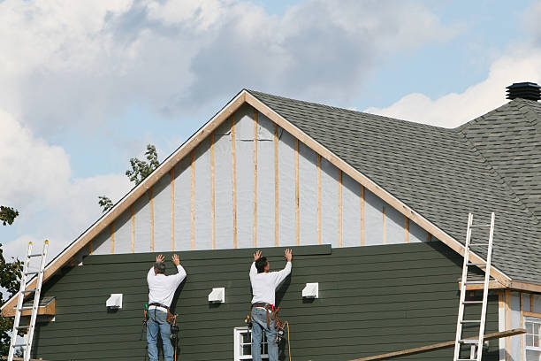 Professional Siding Contractor technician working in Riverside, CT